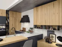 Cucina Colombini casa moderna con penisola rovere moro in legno  finitura in legno di rovere, con venature e nodi in evidenza