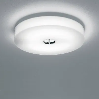 Lampada da parete stile Moderno Mini button Flos con forte sconto