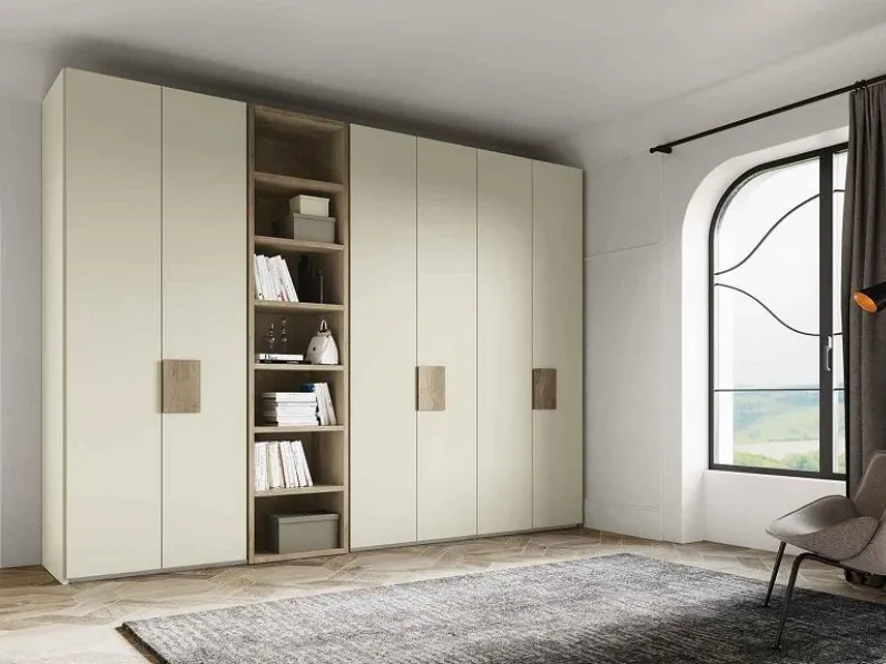 Armadio con ante battenti a prezzo scontato modello Armadio con libreria centrale colore perla opaco di dalcin in promo-sconto del 50% di Dal cin 
