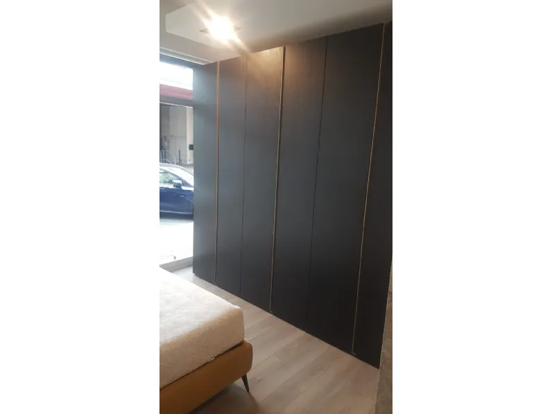 Armadio in laminato materico Armadio con gola a marchio Orme scontato -29%