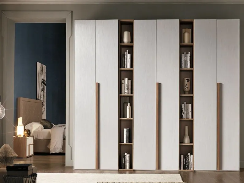 Armadio con ante battenti modello Armadio mod.abaco a 6 ante con librerie scontato del 50%