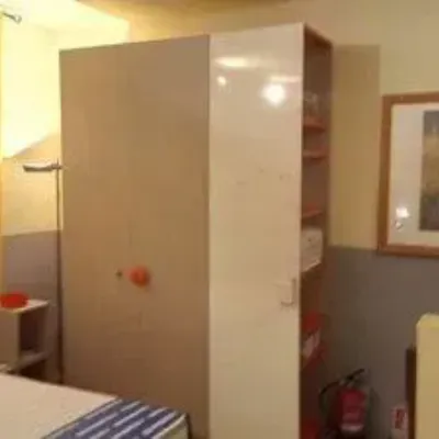 Armadio ante battenti in laminato materico Nidi di Battistella