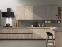 Cucina Nuovi mondi cucine moderna con penisola rovere chiaro in laminato materico Cucina natural zen con colonna e paino penisola 