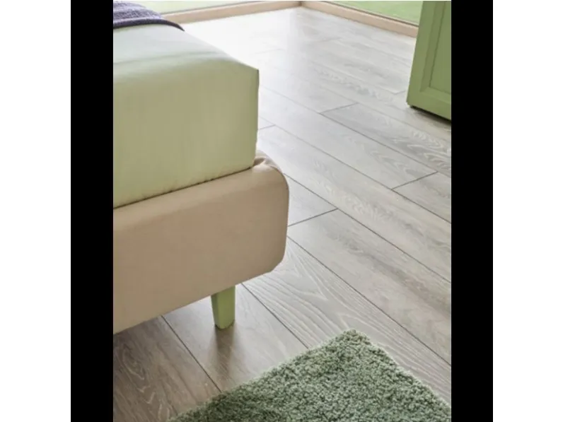 Letto imbottito con giroletto Letto plane pillow Moretti compact a prezzo ribassato