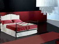 letto con cuscini per testiera