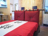 Letto in legno con giroletto Letto zedn japan legno ebambu con cuscinoni red Nuovi mondi cucinea prezzo scontato