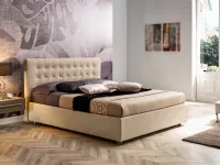 Letto moderno con giroletto Letto modello matrimoniale anima in ecopelle crema con testata lavorata Collezione esclusiva a prezzo scontato