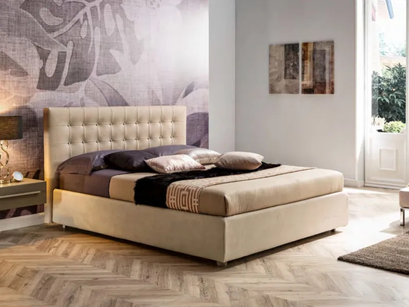Letto moderno con giroletto Letto modello matrimoniale anima in ecopelle crema con testata lavorata Collezione esclusiva a prezzo scontato