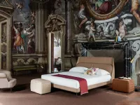 Letto matrimoniale con gambe Coup Poltrona frau a prezzo scontato