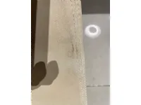 Pouf in tessuto Cubo a marchio Dema a prezzo ribassato