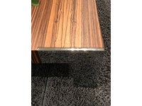Tavolino modello Liko design in finitura legno zebrano. Il tavolino è dotati di quattro robusti piedini di appoggio realizzati in acciaio cromato. Offerta Outlet Mobilgross. Scontato del - 59%