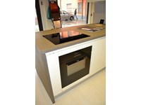 piano cottura e forno in cristallo nero