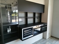Cucina moderna ad isola Dibiesse Area 22 xl 30° gola curva in FENIX nero opaco a prezzo scontato