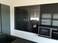 Cucina moderna ad isola Dibiesse Area 22 xl 30° gola curva in FENIX nero opaco a prezzo scontato