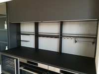 Cucina moderna ad isola Dibiesse Area 22 xl 30° gola curva in FENIX nero opaco a prezzo scontato