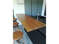 Cucina moderna ad isola Dibiesse Area 22 xl 30° gola curva in FENIX nero opaco a prezzo scontato