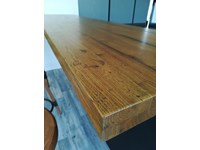 Cucina moderna ad isola Dibiesse Area 22 xl 30° gola curva in FENIX nero opaco a prezzo scontato