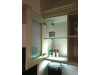 Scavolini Belvedere dettaglio pensile con ripiani in vetro