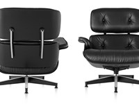 Poltrona e Pouf Charles Heams -Modello Ottoman - Produzione Proiezione , scocca in frassino nero poro aperto e rivestimento in pelle anilina Nera