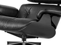 Poltrona e Pouf Charles Heams -Modello Ottoman - Produzione Proiezione , scocca in frassino nero poro aperto e rivestimento in pelle anilina Nera