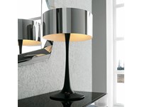 Lampada Pluto di Cattelan con base in poliuretano nero e cilindro in acciaio inox lucido