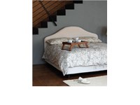 letto modello laguna della dittta hopplą, classico con contenitore, imbottito e testa sagomata