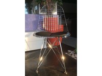 SEDIA EAMES DESIGN IN ACCIAIO CROMATO LUCIDO E CUSCINETTO IN PELLE