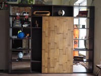 libreria minimale etno con anta scorrevole