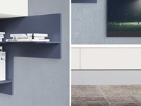 Parete attrezzata con cassettoni a terra e pensili in laccato opaco.