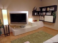 Soggiorno Side System con sistema di mensole angolari
