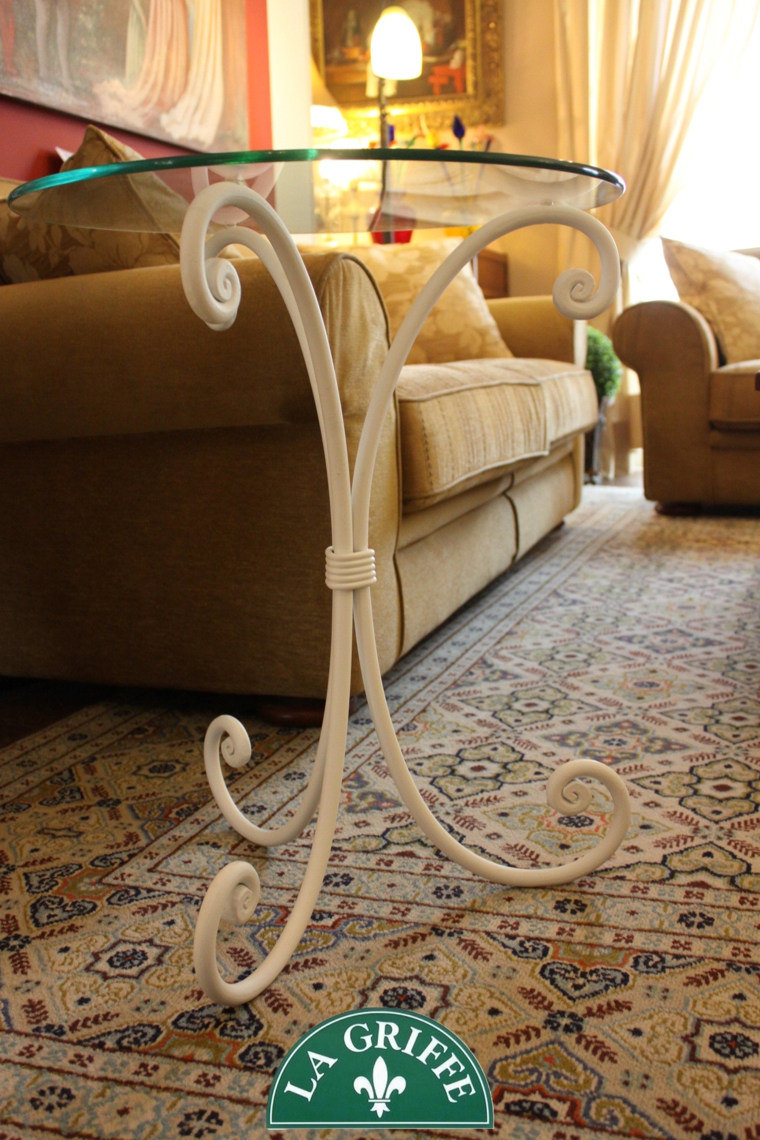 Coppia di tavolini rotondi con piano in vetro e base in ... Coppia di tavolini rotondi con piano in vetro e base in ...